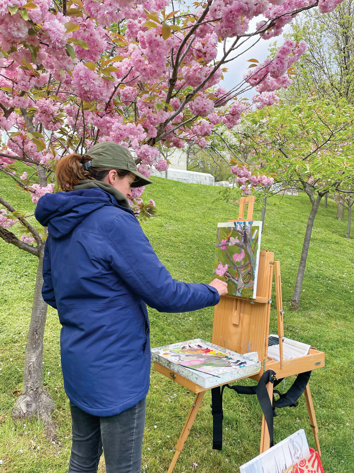 Liz Spector painting blossoms at the Japanese Garden